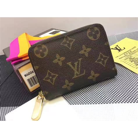 Zippy Coin Purse Monogram Canvas .